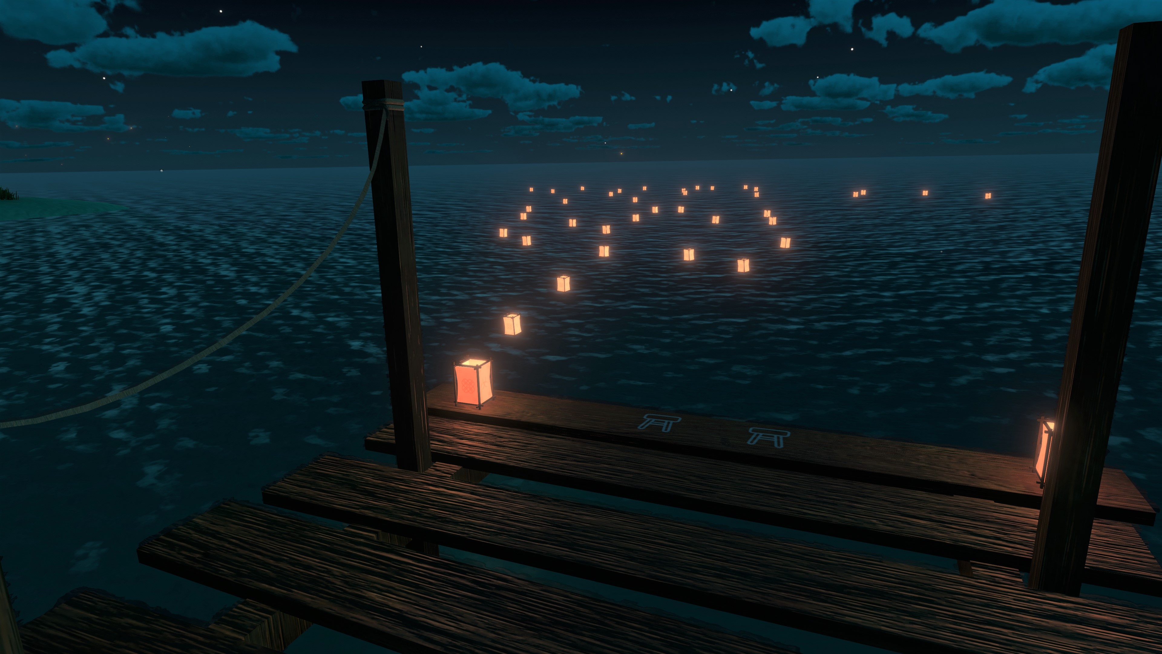 Lanterns floating in the water next to the dock on Firefly Island.